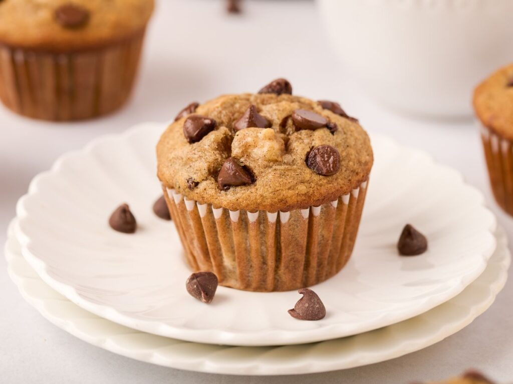Process photos showing how to make this muffin recipe with ripe banana and chocolate chips.