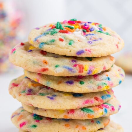 Stack of sugar cookie cookies on a white background.