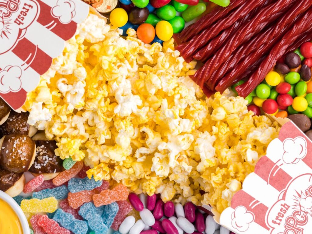 How to put together a movie snack board with candy and popcorn.