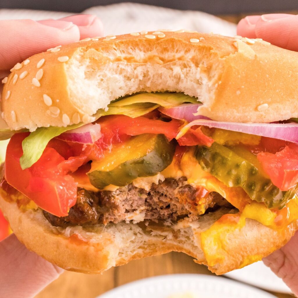A close up bite shot of the burger