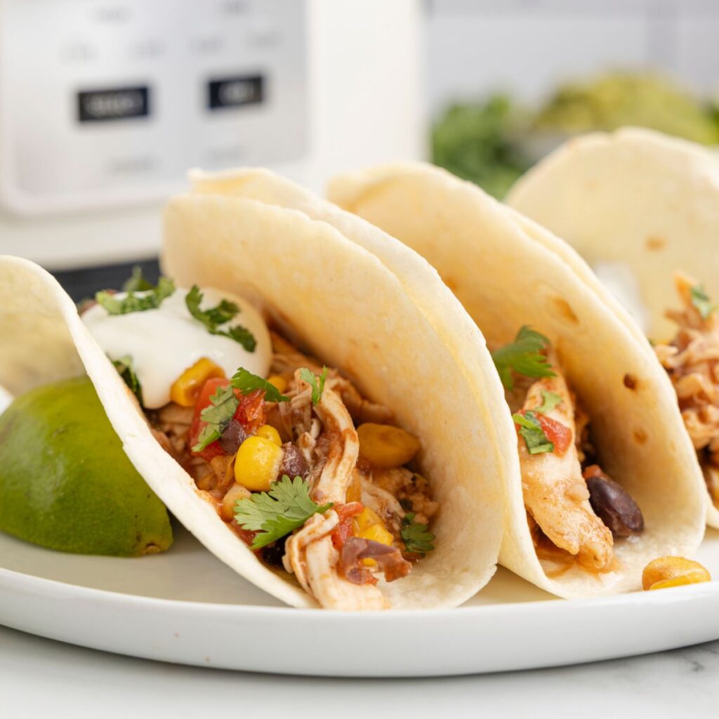 Side view of the chicken tacos. 