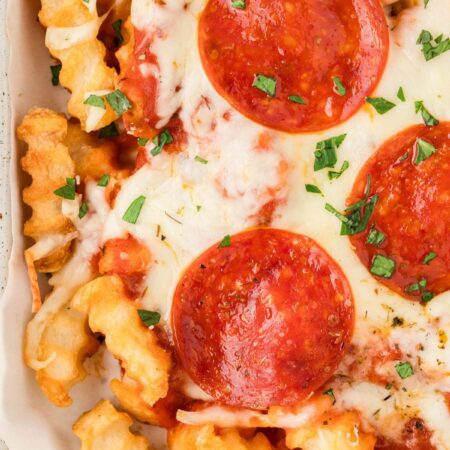 Close up of the cooked pizza fries in a sheet pan
