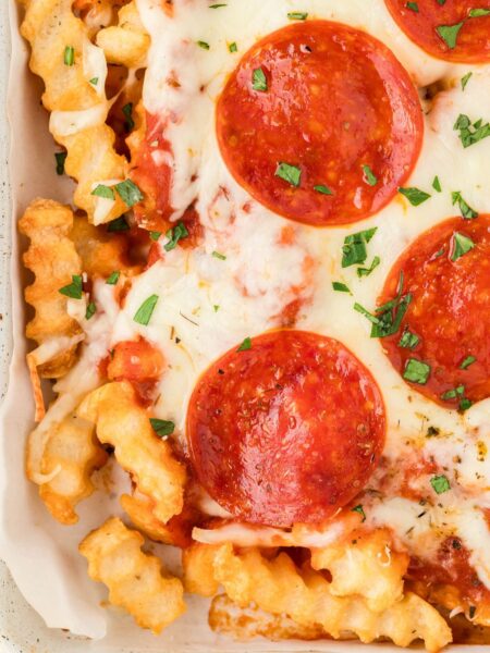 Close up of the cooked pizza fries in a sheet pan