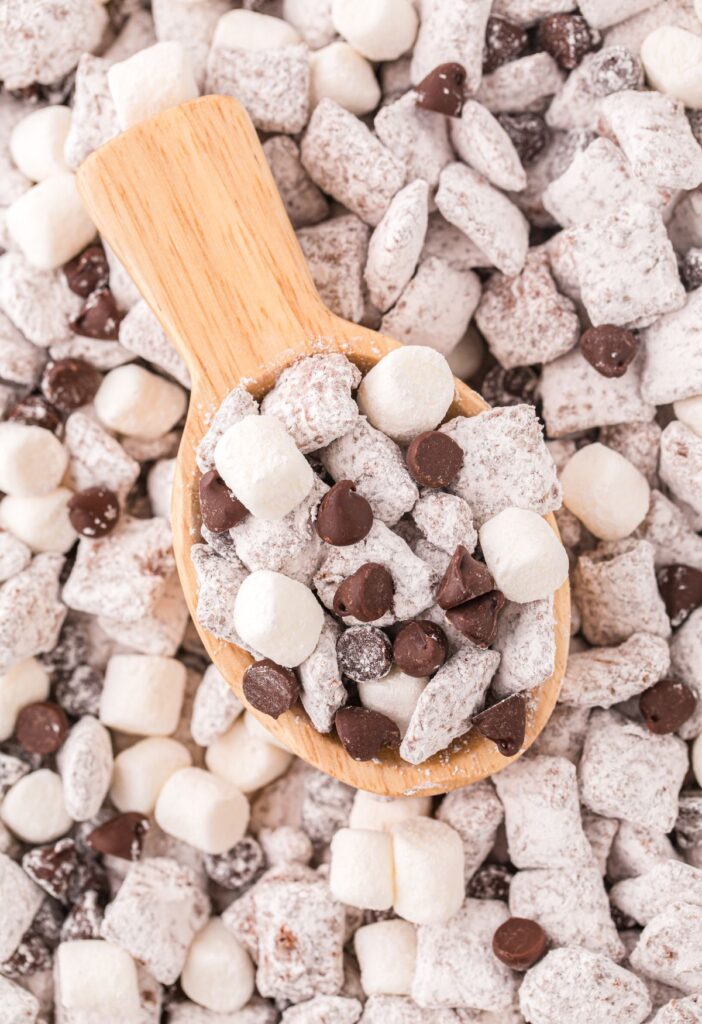 Close up of the muddy buddies with hot cocoa mix.